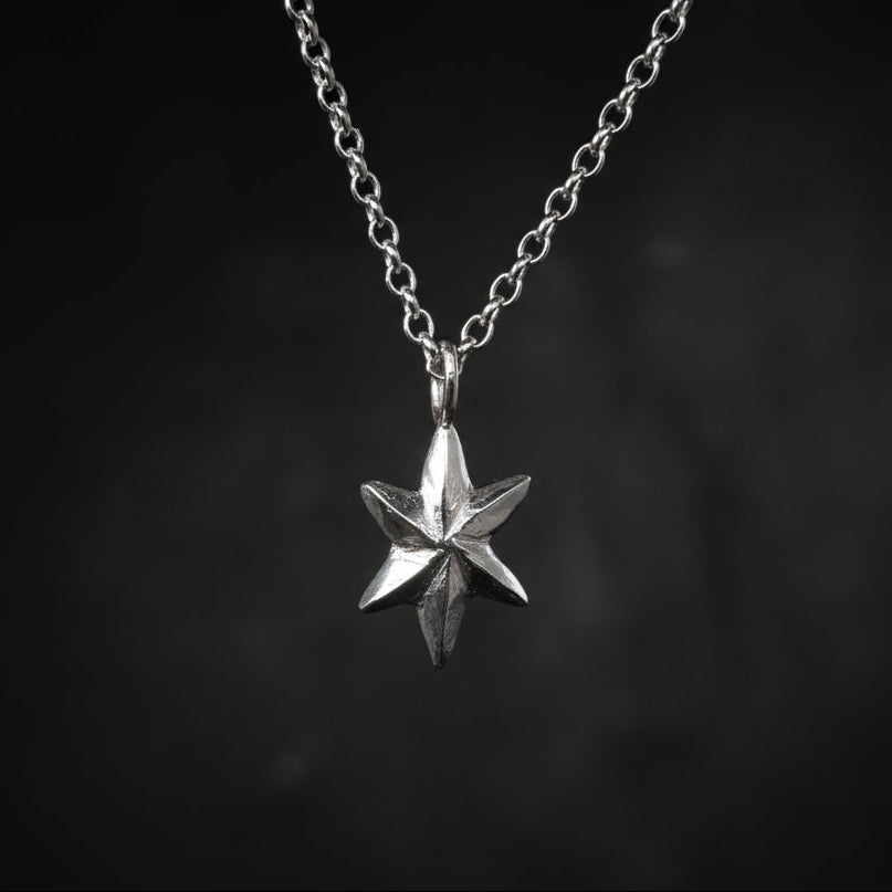 recycled sterling silver 3D facet star necklace hand carved and handmade in recycled sterling silver by Jo Cooper Jewellery