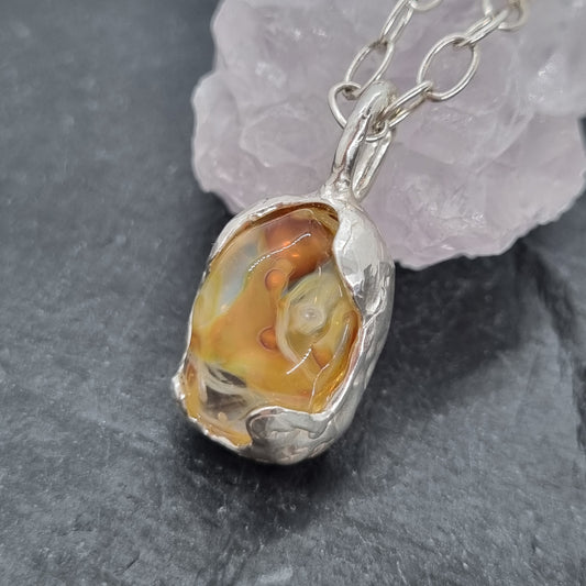 silver granules in glass pendant set in sterling silver by Jo Cooper and SIECES GLASS