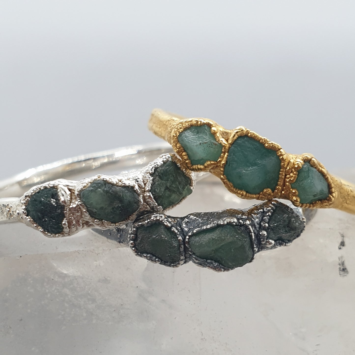 triple raw emerald rings silver oxidised and gold