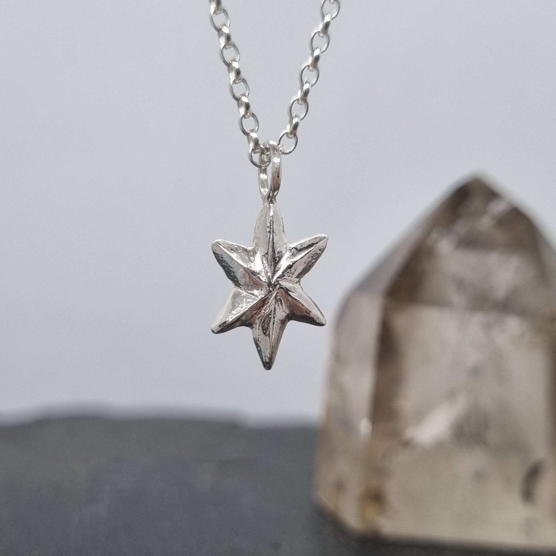 recycled sterling silver 3D facet star necklace hand carved and handmade in recycled sterling silver by Jo Cooper Jewellery