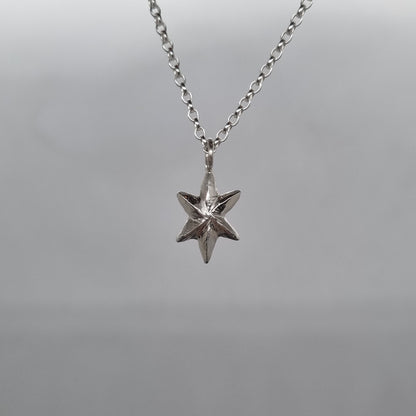 recycled sterling silver 3D facet star necklace hand carved and handmade in recycled sterling silver by Jo Cooper Jewellery