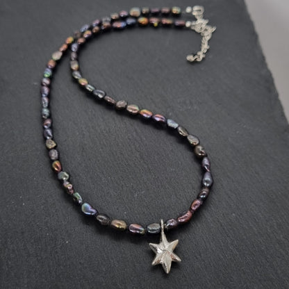 3D faceted hand carved sterling silver star on a grey peacock freshwater pearl bead necklace by Jo Cooper