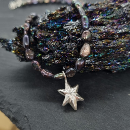 3D faceted hand carved sterling silver star on a grey peacock freshwater pearl bead necklace by Jo Cooper