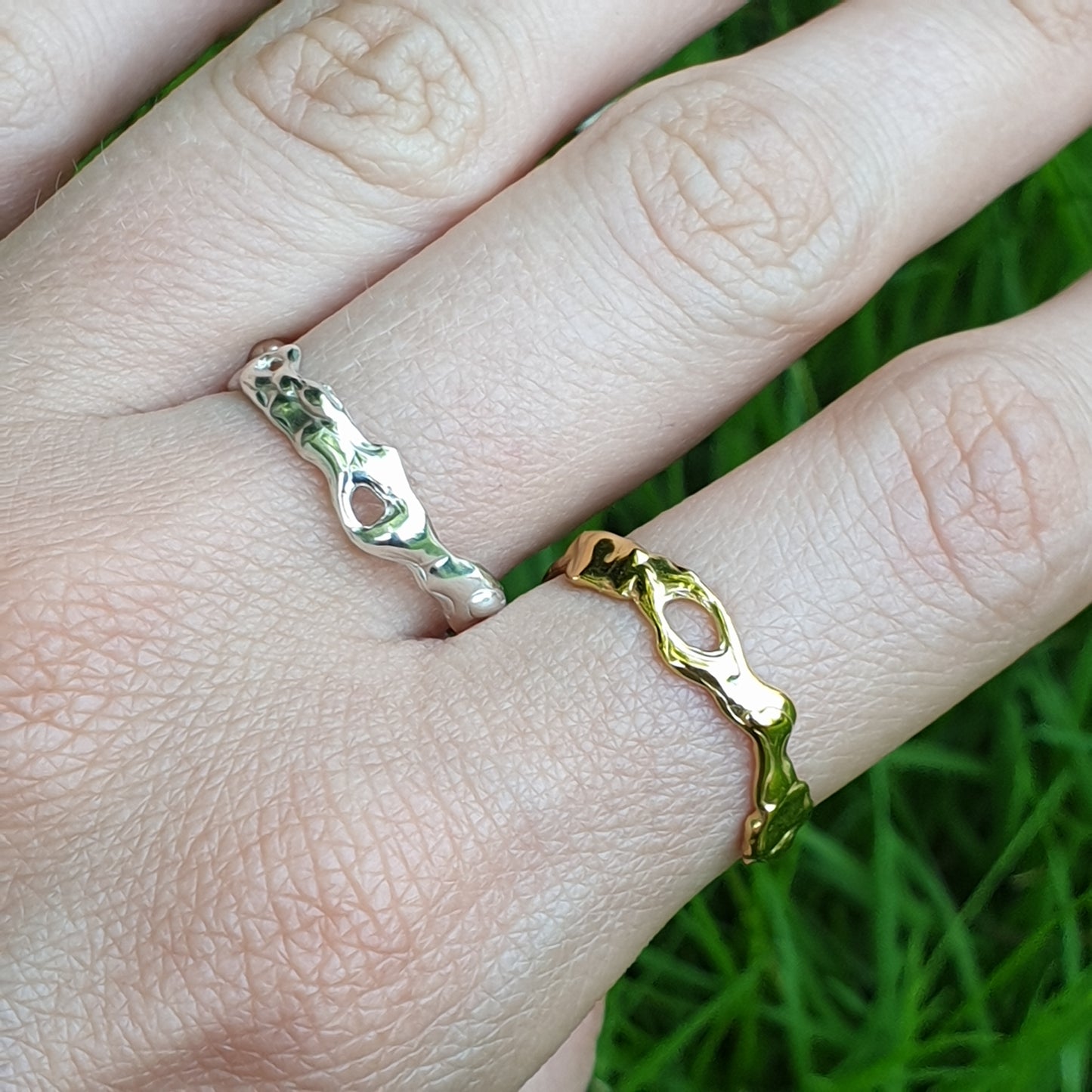 molten rings gold and silver on hand