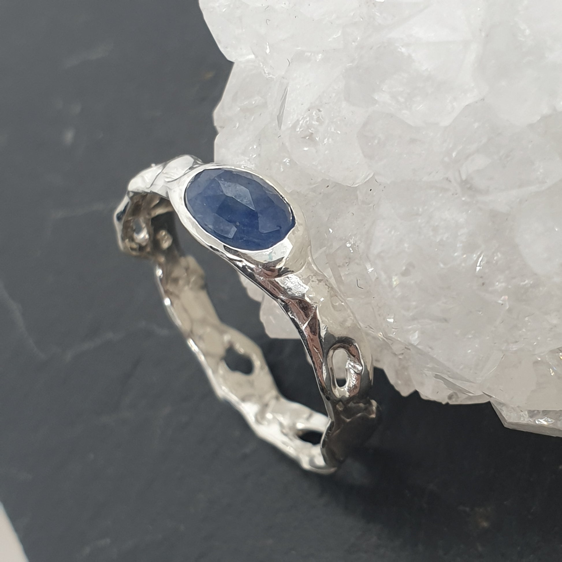 molten sterling silver ring with rose cut oval natural blue sapphire