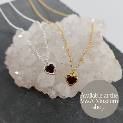 silver and gold faceted garnet heart necklace handmade by Jo Cooper. Also available at the V&A museum shop in London, UK.