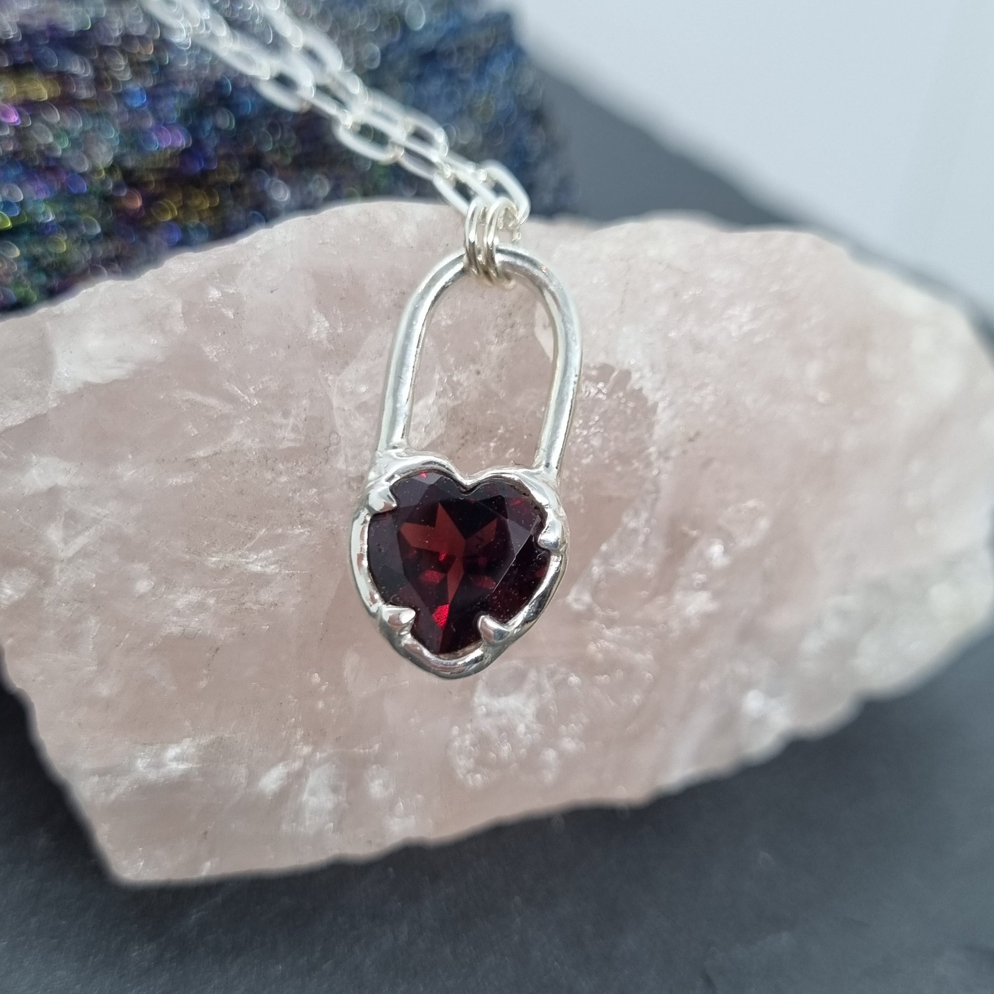 sterling silver heart lock necklace with Mozambique red garnet handmade by Jo Cooper