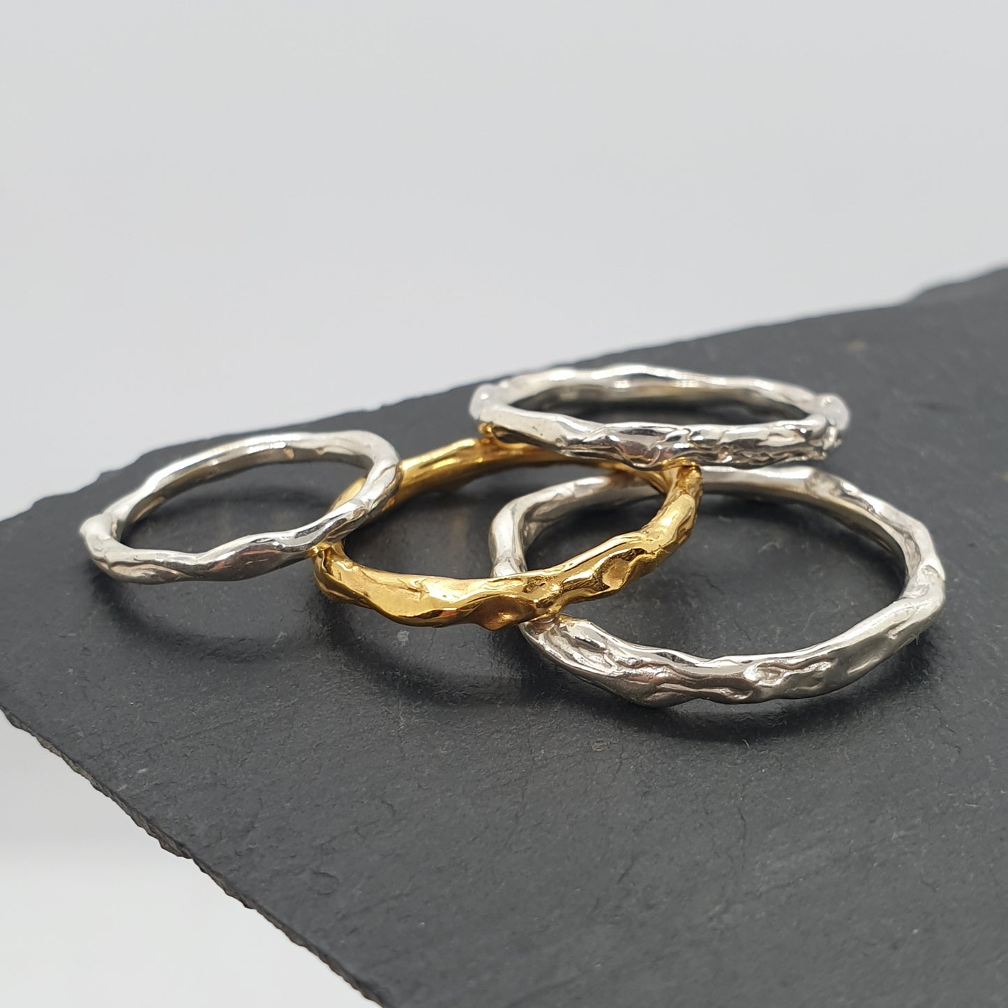 molten sterling silver and gold rings