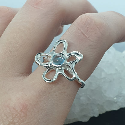 flower sterling silver ring with swiss blue topaz cabochon gemstone