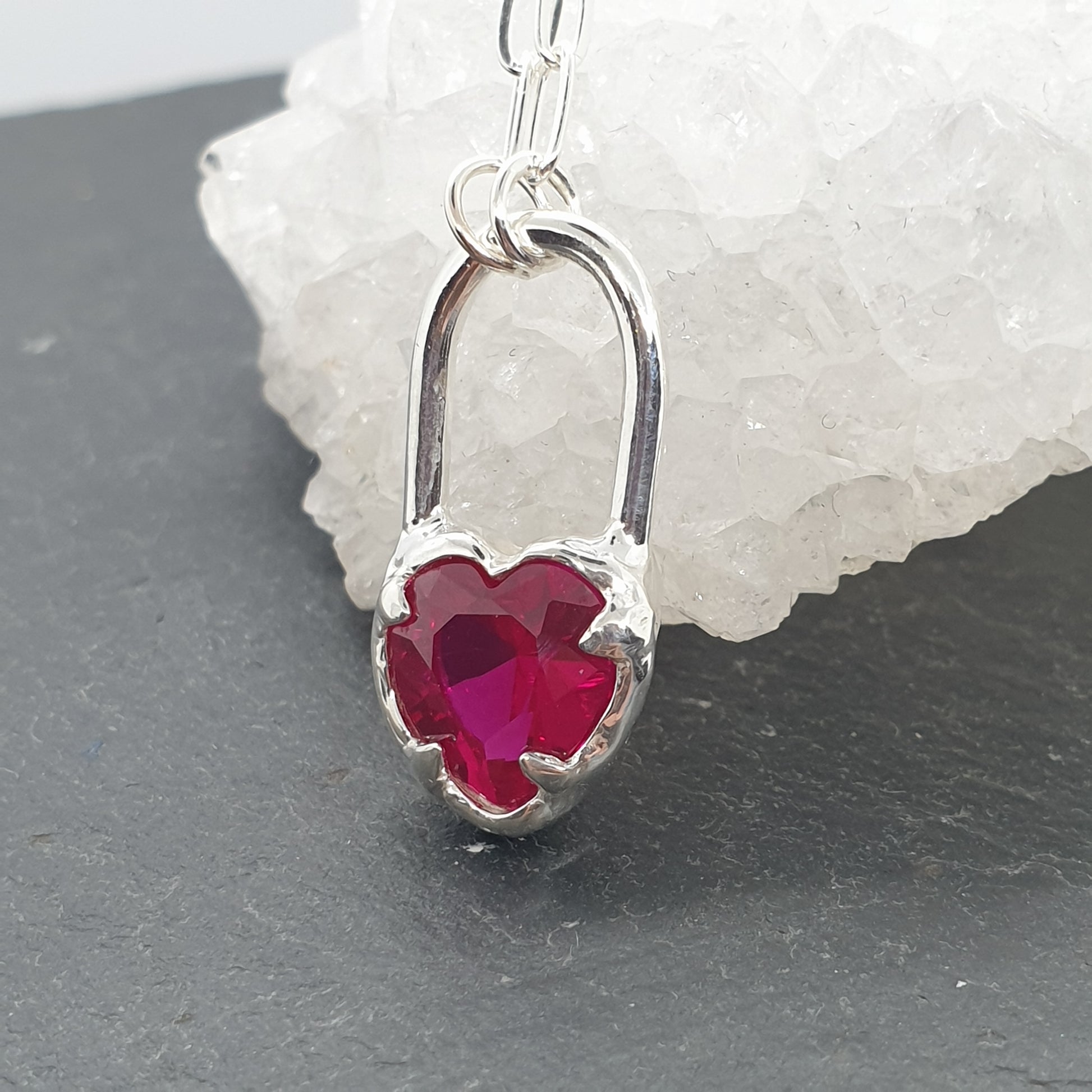 sterling silver heart lock necklace with lab grown ruby on paperclip chain