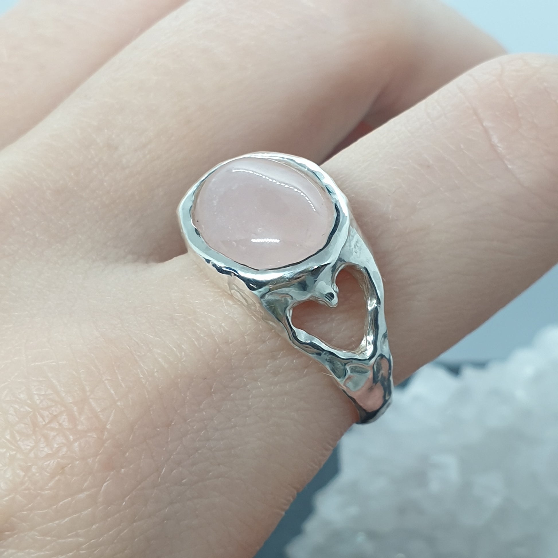 oval rose quartz sterling silver ring with cut out heart