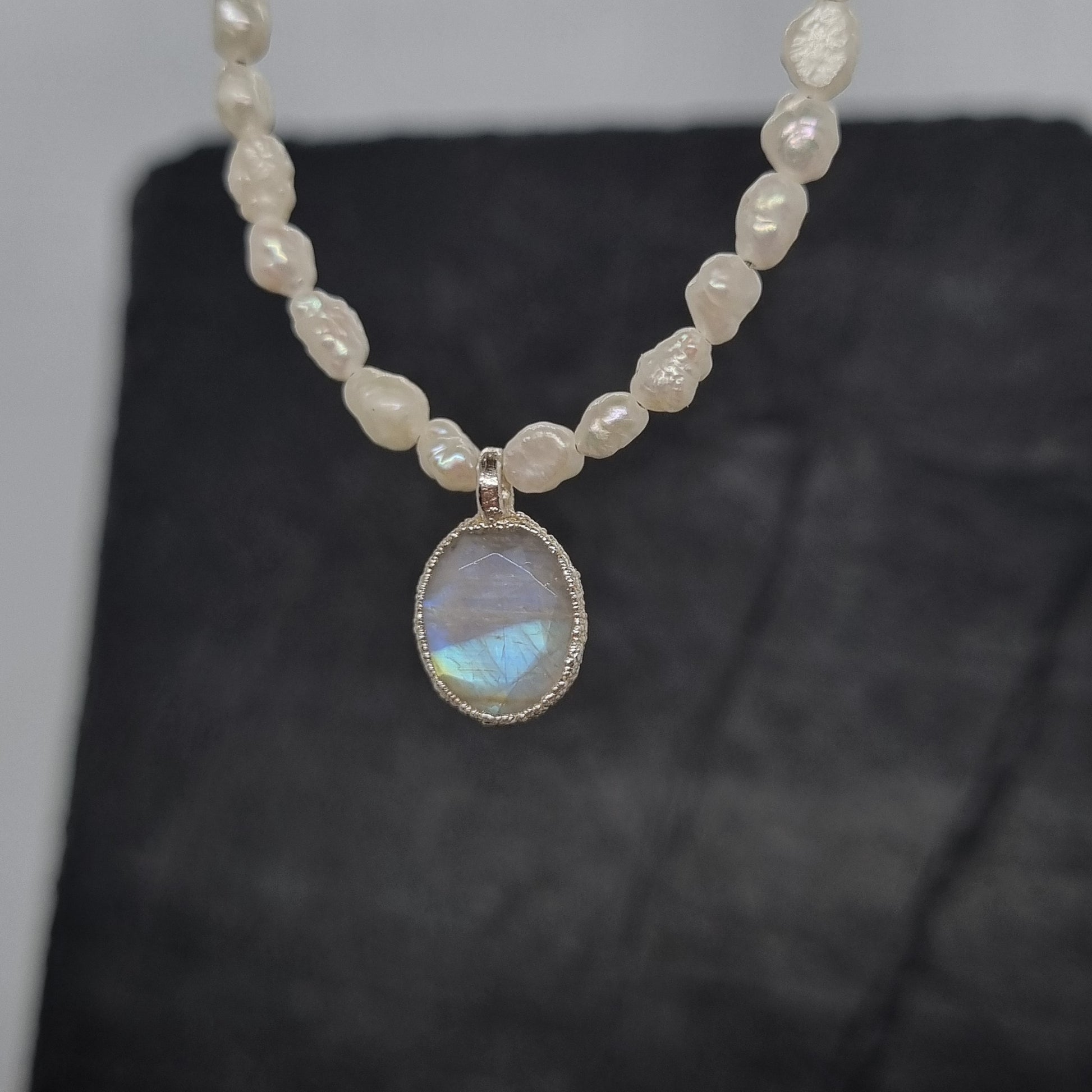 Pearl necklace with a rainbow moonstone pendant handmade by Jo Cooper