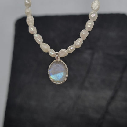 Pearl necklace with a rainbow moonstone pendant handmade by Jo Cooper