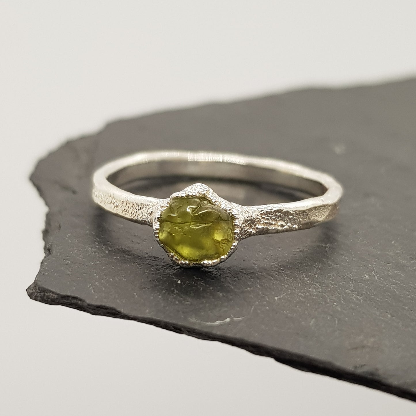 raw peridot silver ring