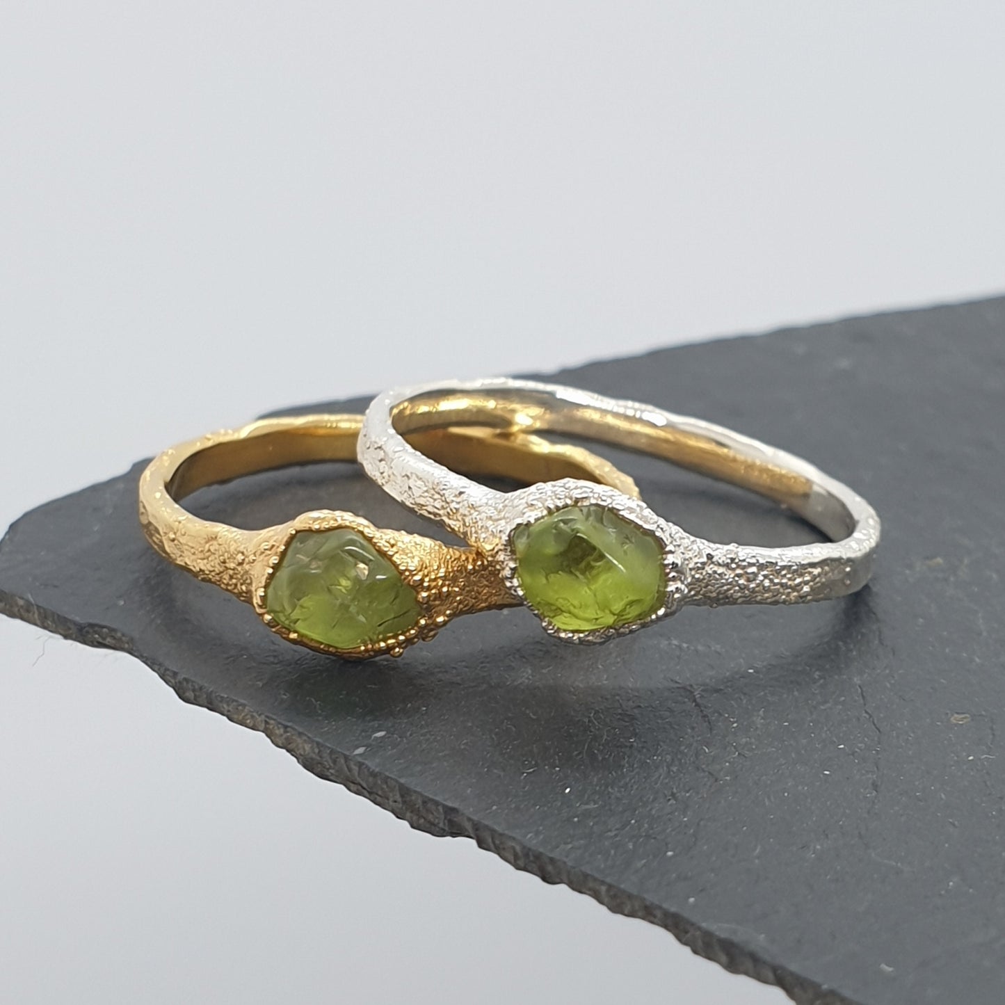 raw peridot silver and gold rings