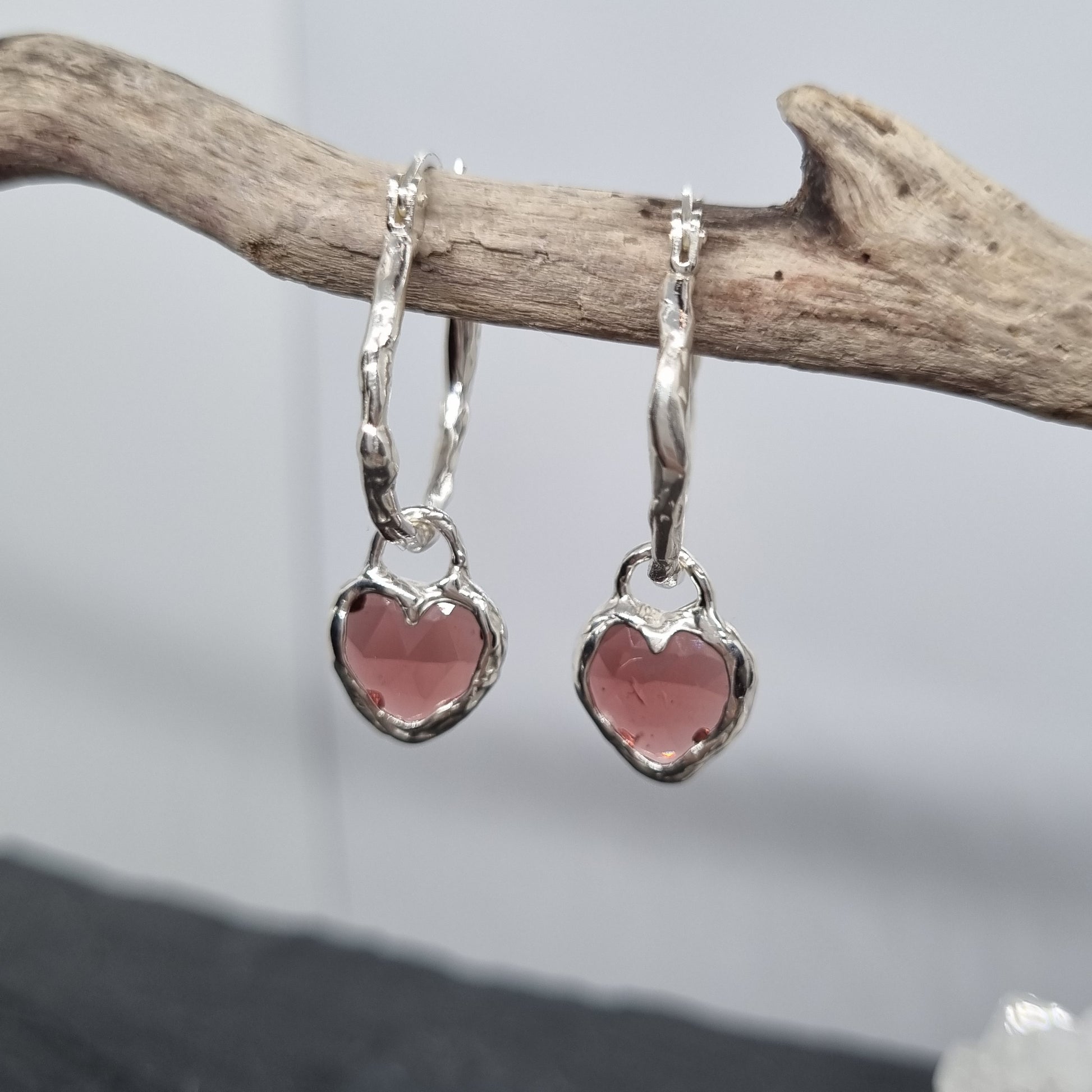 Heart-shaped rose cut red garnet molten sterling silver molten hoops earrings handmade by Jo Cooper Jewellery