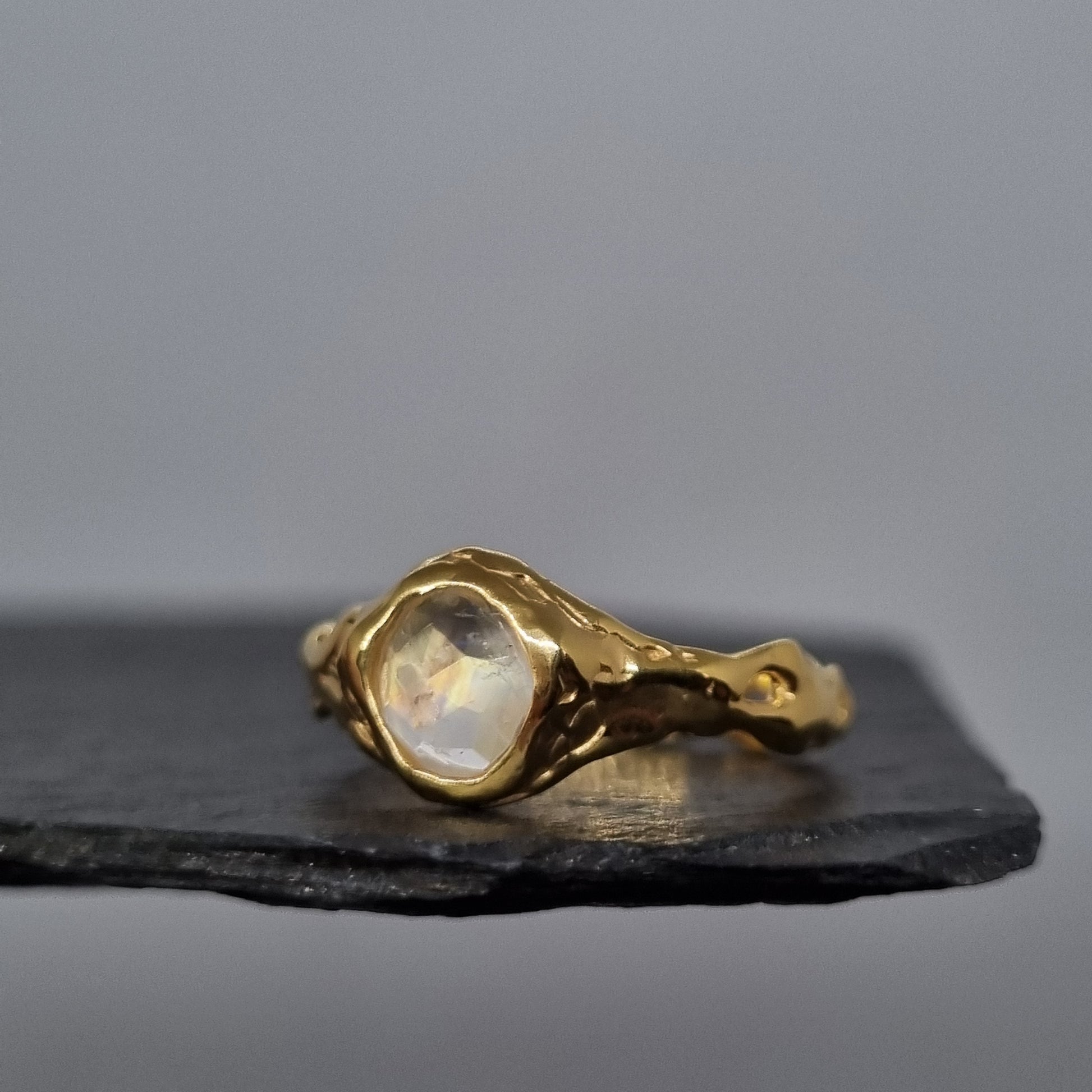 molten textured gold ring with rose cut moonstone gemstone