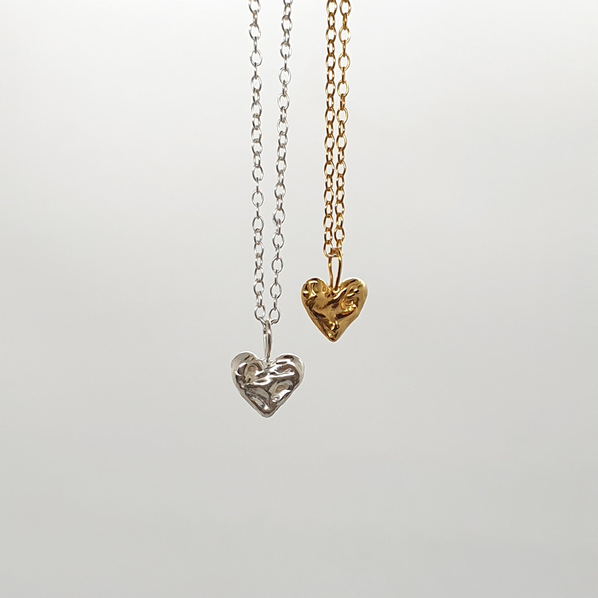 tiny molten heart necklace sterling silver and gold plated