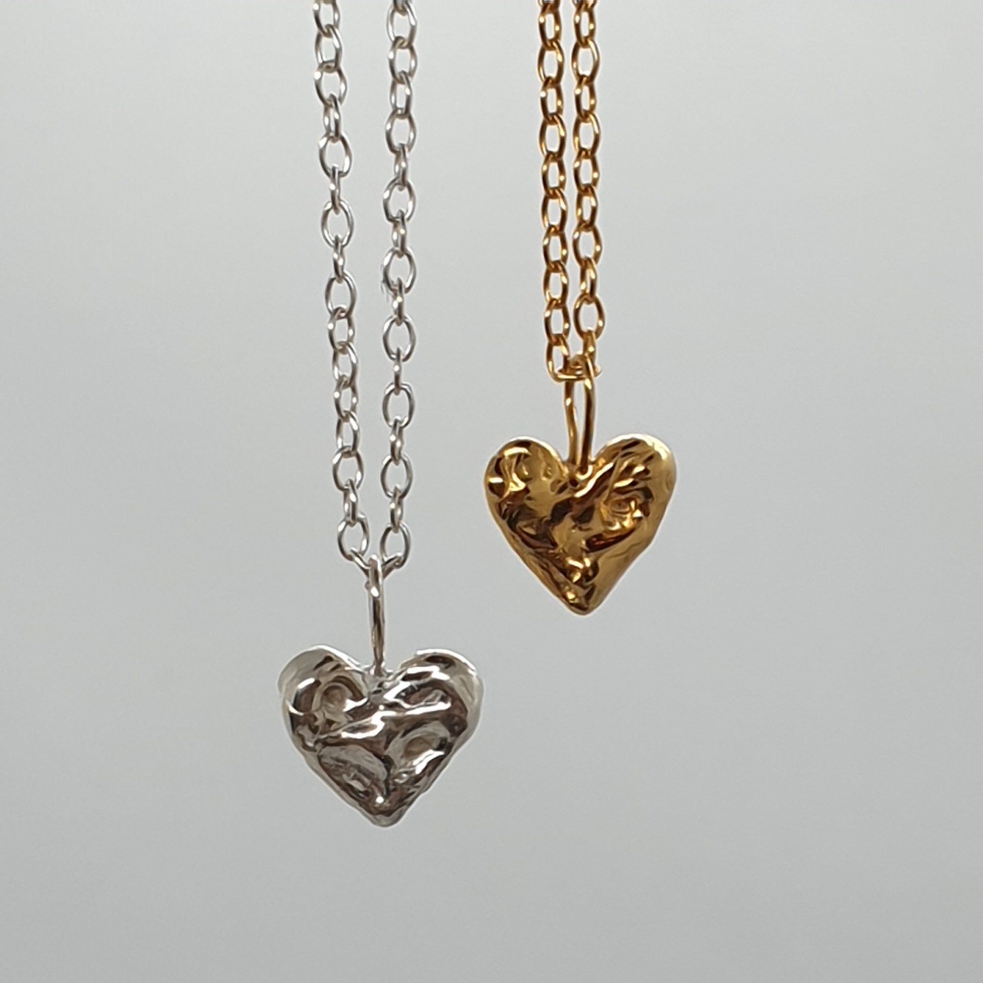 sterling silver and gold tiny molten heart necklace 