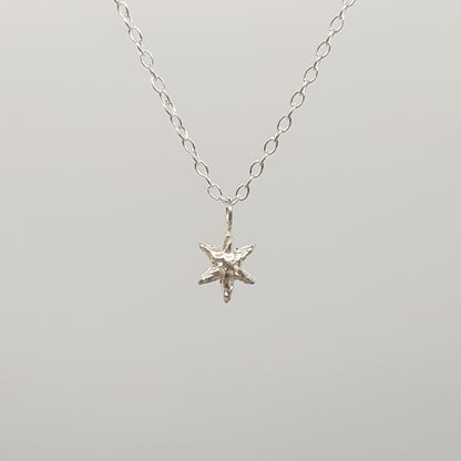 tiny molten star necklace sterling silver