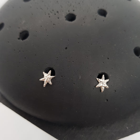 tiny star stud earrings sterling silver