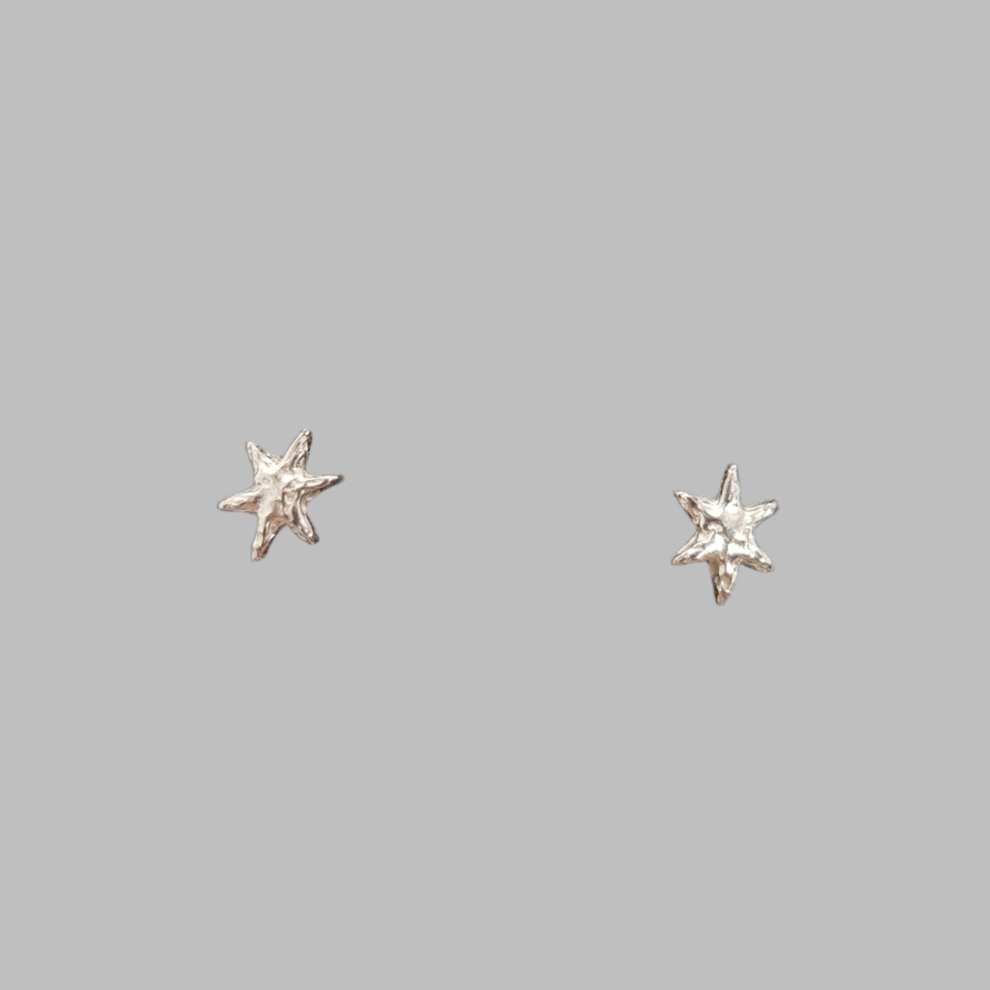 tiny star stud earrings sterling silver