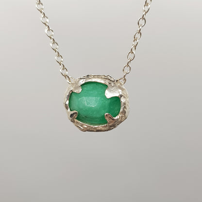 A sterling silver necklace with a rose cut emerald pendant handmade by Jo Cooper Jewellery