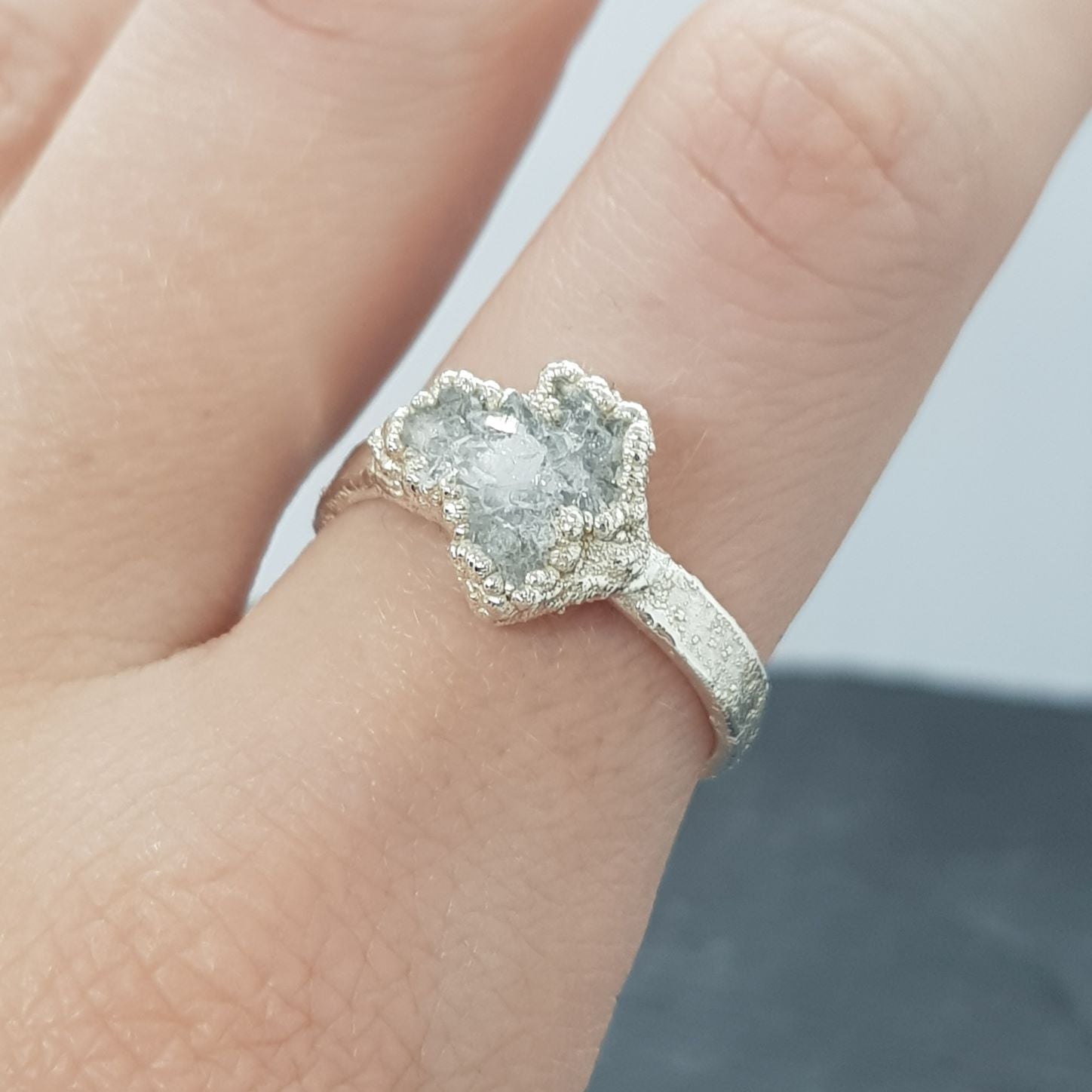 snow quartz druzy cluster ring modelled on finger