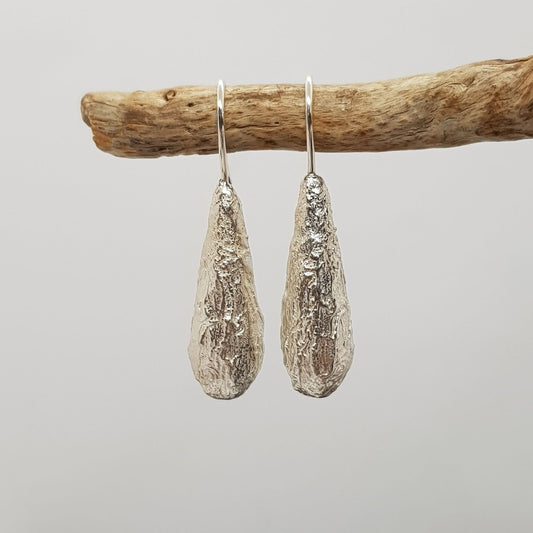 organic textured silver long drop hook earrings